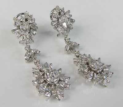 Lot 2223 - A pair of white metal diamond fancy double...