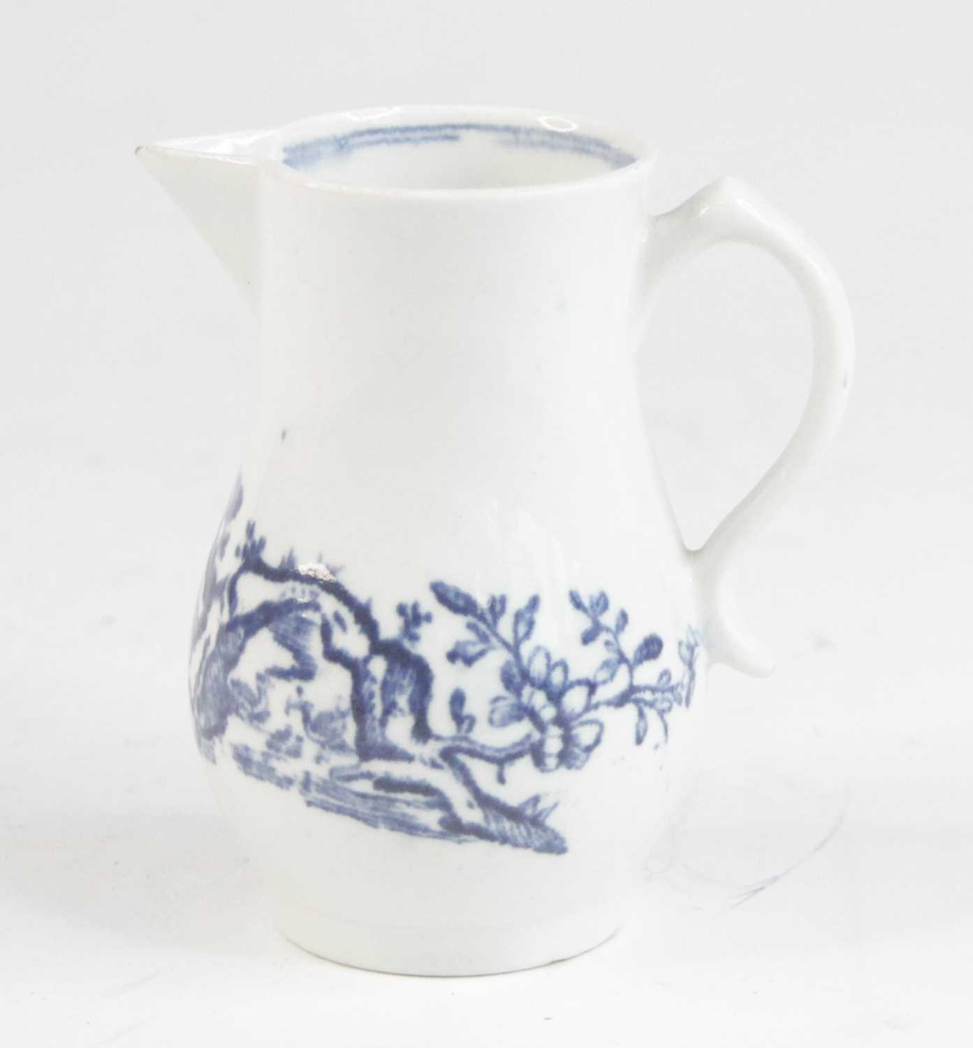 Lot 2038 - A Lowestoft porcelain sparrowbeak cream jug,...