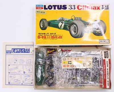 Lot 664 - A Bandai 1/12th scale model kit of a Lotus 33...