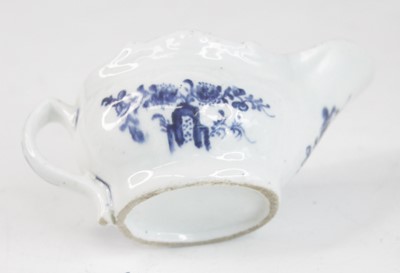 Lot 2037 - A Lowestoft blue and white porcelain butter...