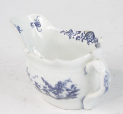 Lot 2037 - A Lowestoft blue and white porcelain butter...