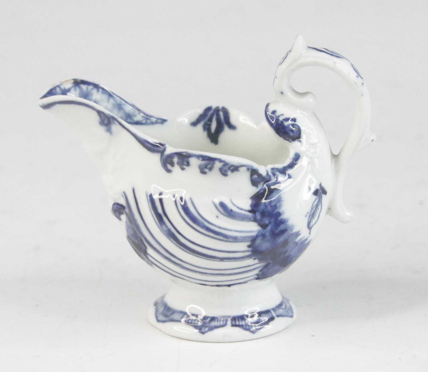 Lot 2031 - A Derby blue and white porcelain dolphin cream...