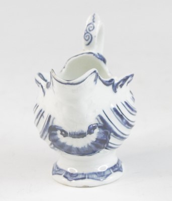 Lot 2031 - A Derby blue and white porcelain dolphin cream...