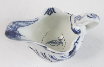 Lot 2031 - A Derby blue and white porcelain dolphin cream...