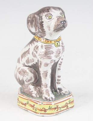Lot 2030 - A Delft or Faience polychrome model of a dog,...