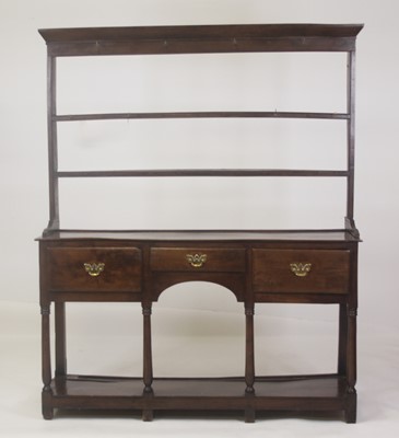 Lot 2481 - A George III joined oak Welsh dresser, having...