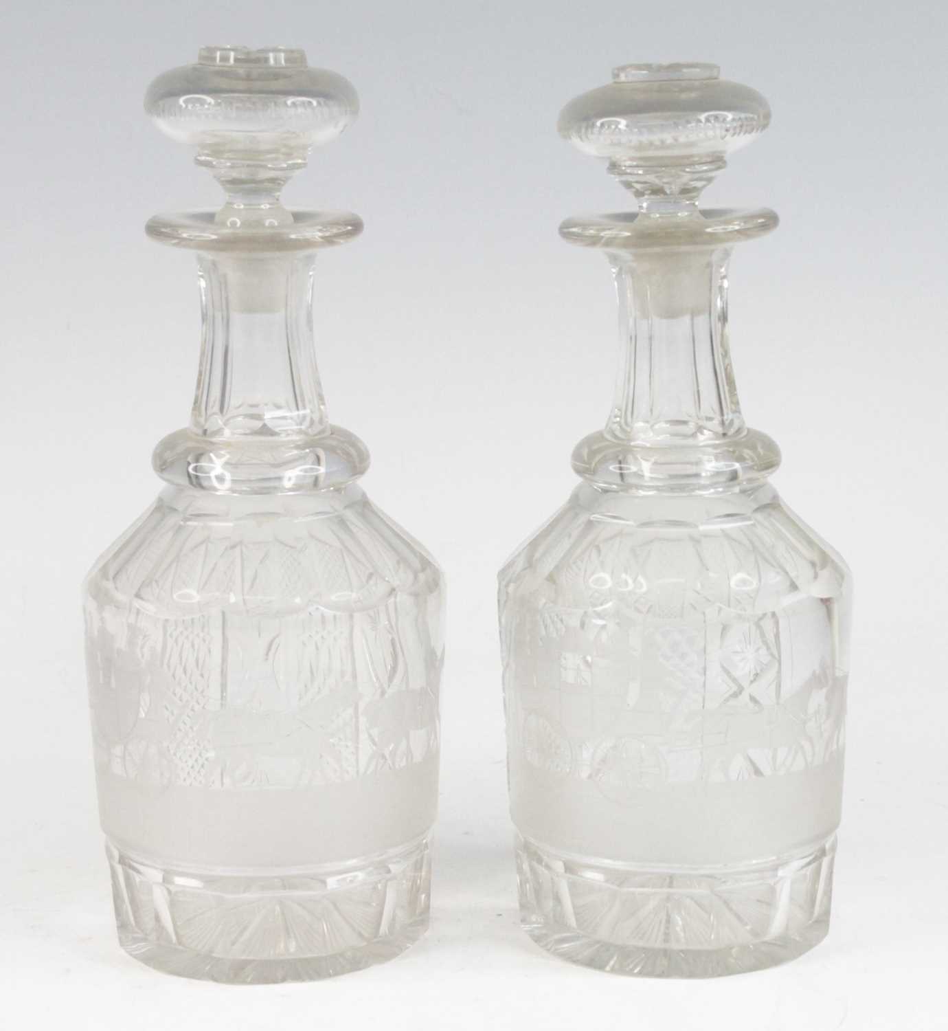 Lot 2052 - A pair of glass decanters, early 19th century,...