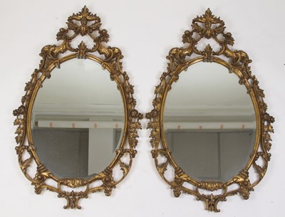 Lot 2487 - A pair of Rococo style gilt composition framed...