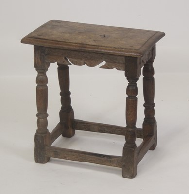 Lot 2534 - A circa 1700 oak joint stool, the top having a...