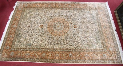 Lot 2520 - An Indian fineweave silk Tabriz carpet, having...