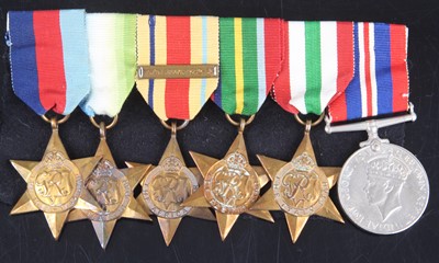 Lot 45 - A group of six WW II medals, to include...