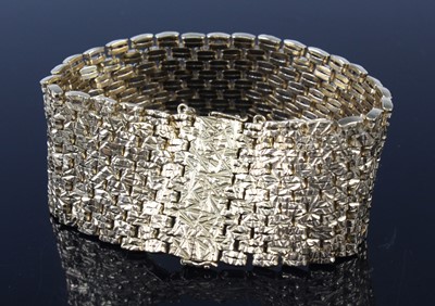 Lot 2240 - A modern 9ct gold heavy textured link bracelet,...