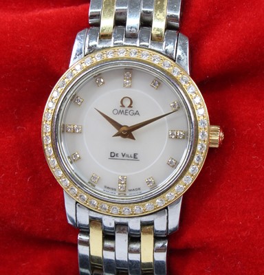 Lot 2260 - A lady's bi-metal Omega DeVille diamond dial...