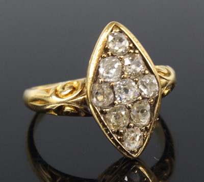 Lot 2153 - A late Victorian yellow metal diamond navette...