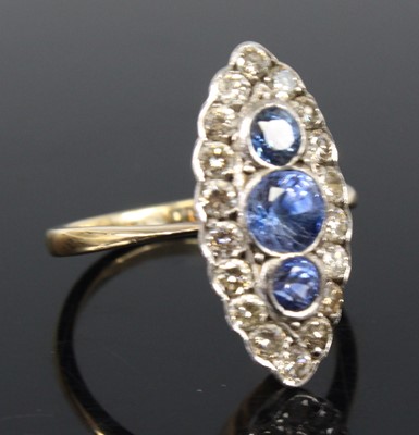 Lot 2215 - A yellow and white metal, sapphire and diamond...