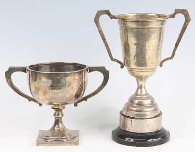 Lot 385 - A George V silver twin handled trophy cup with...