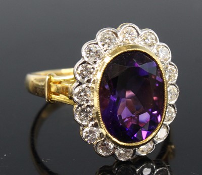 Lot 2193 - An 18ct yellow gold, amethyst and diamond oval...