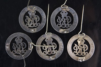 Lot 52 - A collection of five WW I Silver War badges,...