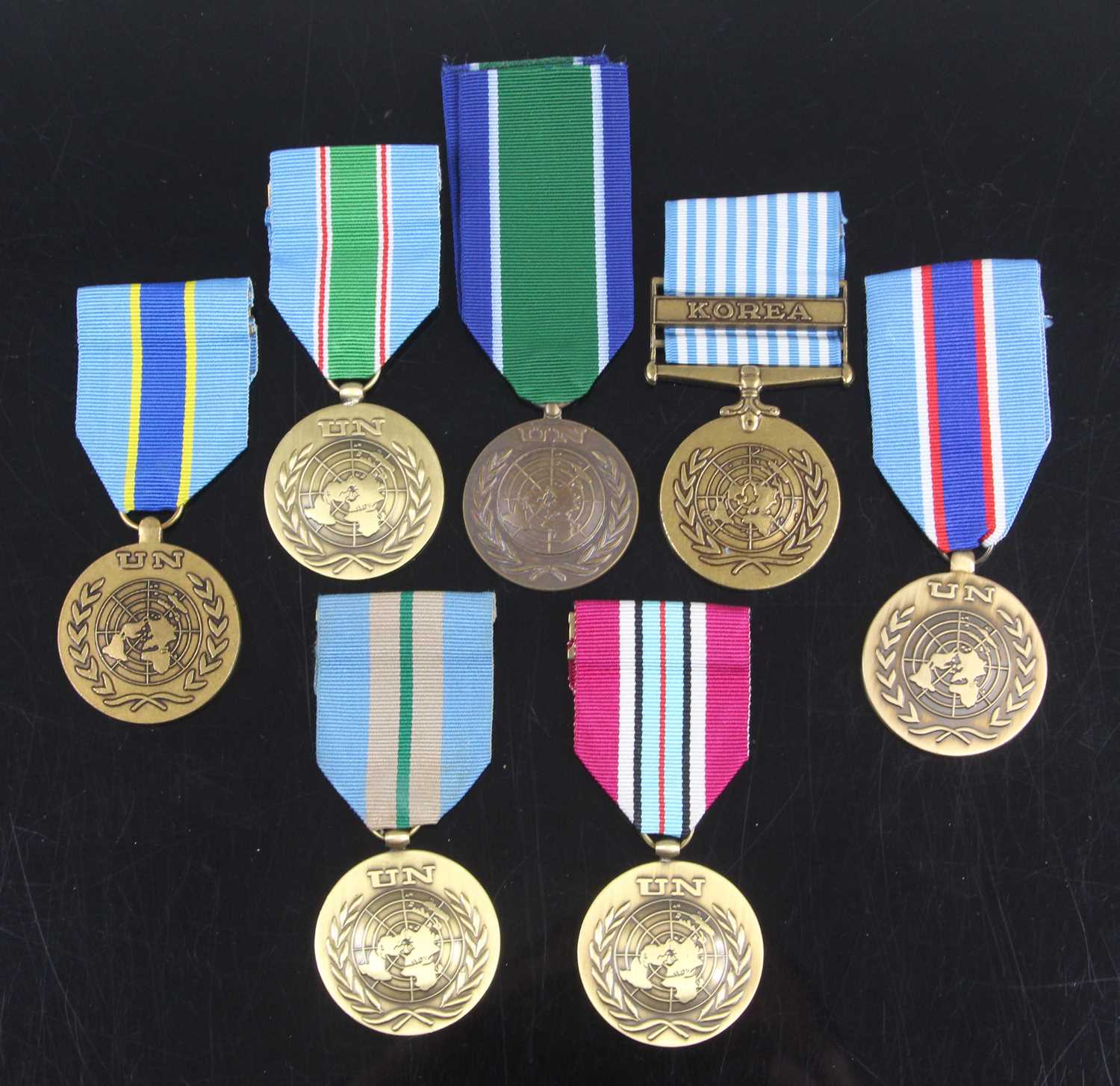 Lot 53 - A collection of seven United Nations medals,...