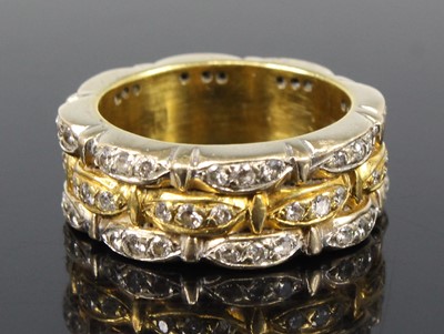 Lot 2211 - A yellow and white metal diamond three-row...