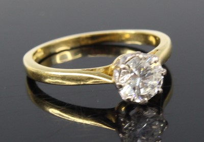 Lot 2235 - An 18ct gold diamond solitaire ring, the eight-...