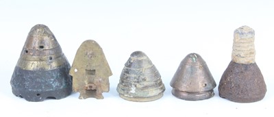 Lot 210 - A collection of WW I shell fuse nose cones etc.