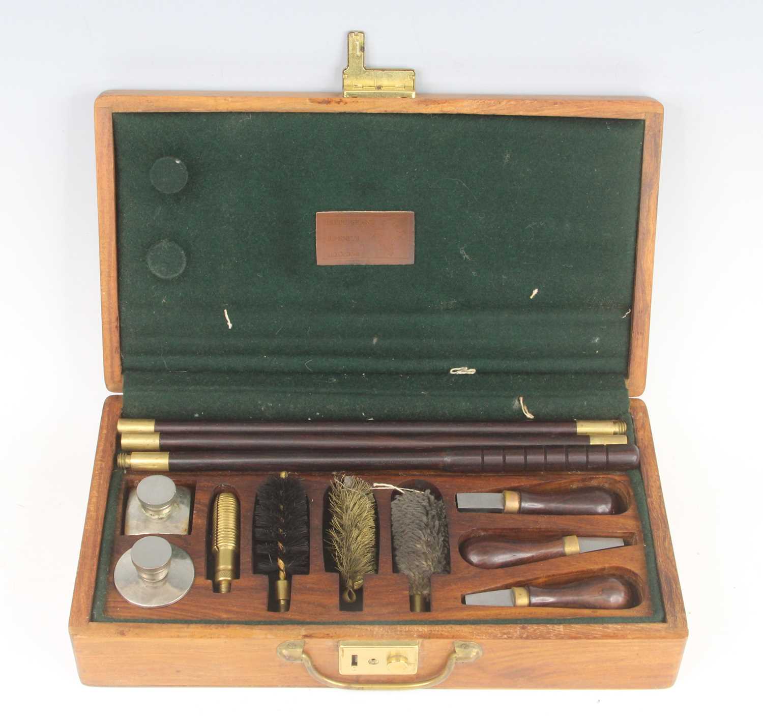 Lot 412 - A gun cleaning kit to include rods, brushes...