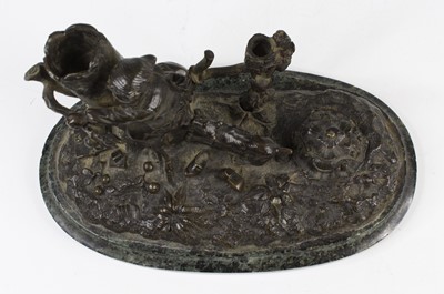Lot 28 - A circa 1900 bronze inkstand, of oval form,...