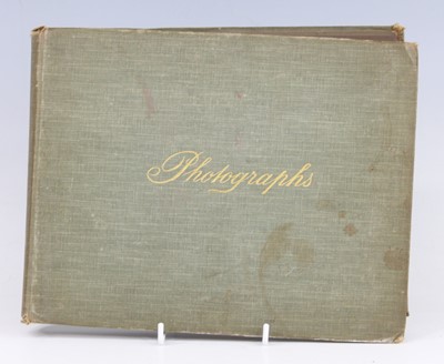 Lot 8 - An early 20th century photograph album, the...