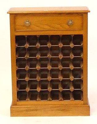 Lot 1517 - A contemporary oak 36-bottle capacity wine...