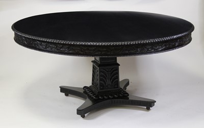 Lot 2464 - An ebonised hardwood pedestal breakfast in the...