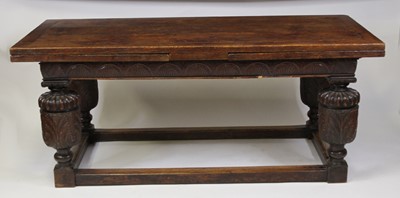 Lot 2492 - An antique oak drawleaf refectory table,...