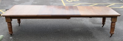 Lot 2539 - A mid-Victorian walnut extending dining table,...