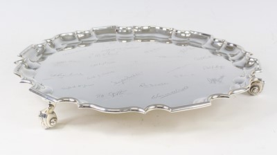 Lot 2133 - A George V silver salver, having a raised...