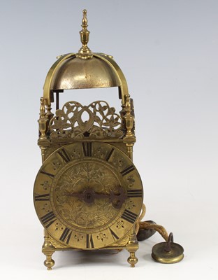 Lot 2444 - A circa 1700 brass lantern clock, the leaf and...