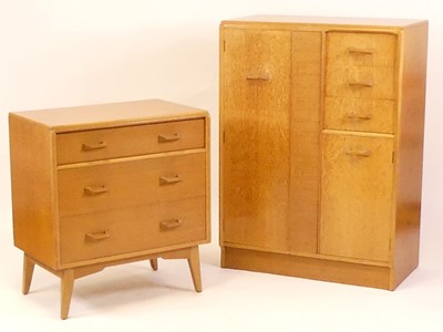 Lot 777 - Ernest Gomme for G-Plan - a 1960s light oak...