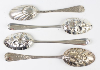 Lot 2066 - A pair of George III silver berry spoons, each...