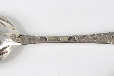 Lot 2066 - A pair of George III silver berry spoons, each...