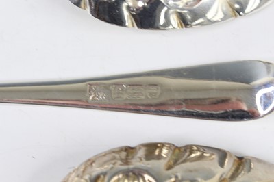 Lot 2066 - A pair of George III silver berry spoons, each...