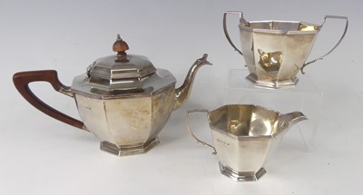 Lot 573 - An Art Deco silver three-piece tea set by...