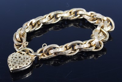 Lot 2179 - A contemporary 9ct gold belcher link bracelet,...