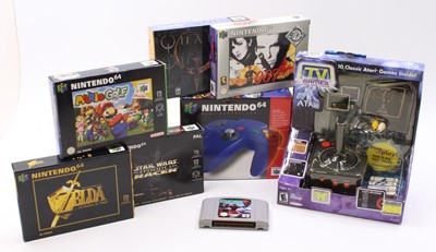 Lot 1625 - One tray of Nintendo 64 and Atari related...