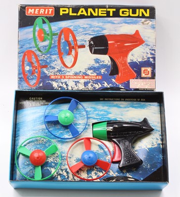 Lot 1705 - A Merit Toys boxed plastic Planet Gun complete...