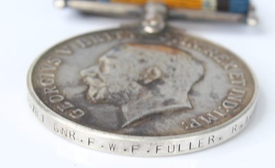 Lot 96 - A WW I family group of medals to include...