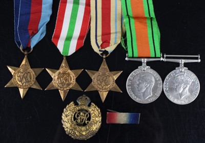 Lot 99 - A WW II group fo four medals to include...