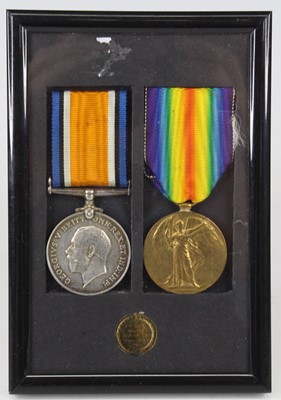 Lot 109 - A WW I British War and Victory pair, naming...