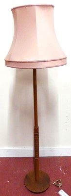 Lot 783 - A 1960s probably G-Plan teak standard lamp,...