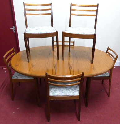 Lot 784 - A 1960s G-Plan 'Fresco' teak dining suite,...