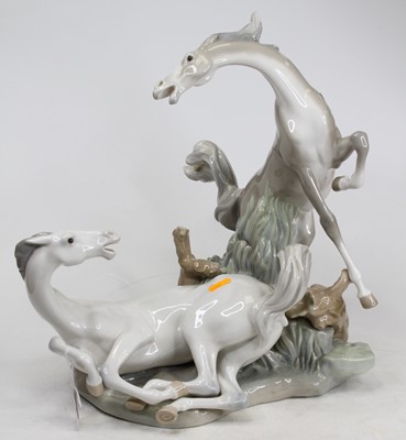 Lot 5 - A large Lladro porcelain horse group, height 40cm