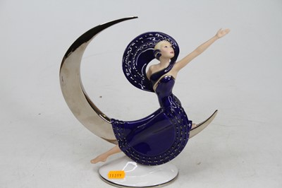 Lot 22 - A Franklin Mint porcelain figure of a lady...